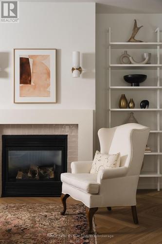 101 - 80 Palace Pier Court, Toronto, ON - Indoor Photo Showing Living Room With Fireplace