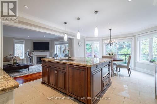 4027 Lookout Court, Mississauga, ON - Indoor Photo Showing Kitchen With Fireplace With Double Sink