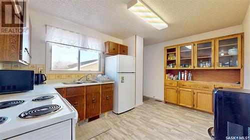 66 Hatton Crescent, Regina, SK - Indoor Photo Showing Kitchen With Double Sink