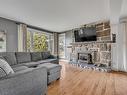 Salon - 500 Rue Des Plaines-Rouges, Québec (La Haute-Saint-Charles), QC  - Indoor Photo Showing Living Room With Fireplace 