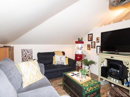 Family room - 626 Boul. Hébert, Saint-Pascal, QC - Indoor Photo Showing Living Room With Fireplace