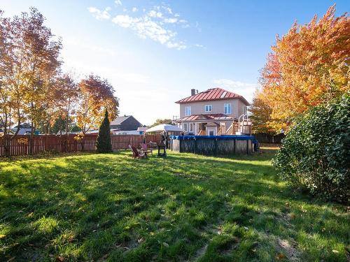 Back facade - 626 Boul. Hébert, Saint-Pascal, QC - Outdoor With Backyard