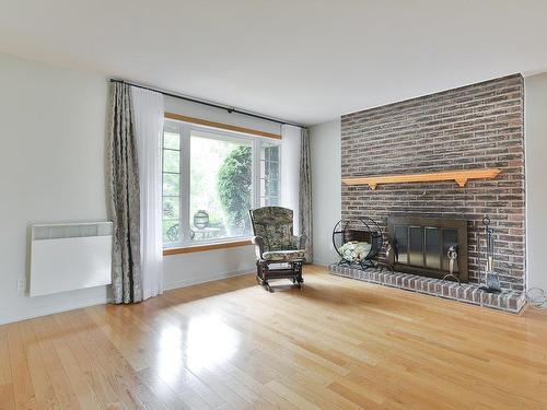 Salon - 210 Rue King-Edward, Longueuil (Le Vieux-Longueuil), QC - Indoor Photo Showing Living Room With Fireplace