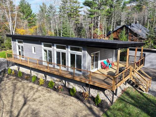 FaÃ§ade - 164 Ch. Dubois, Val-Des-Monts, QC - Outdoor With Deck Patio Veranda