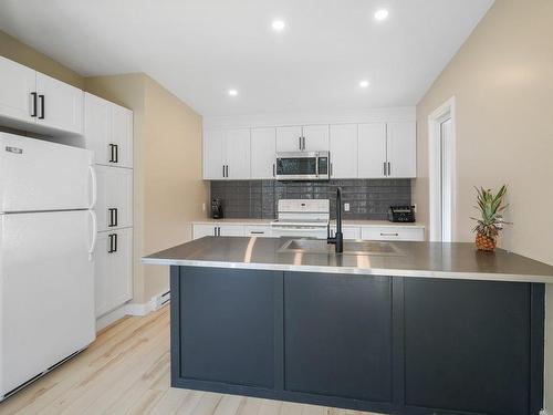 Cuisine - 164 Ch. Dubois, Val-Des-Monts, QC - Indoor Photo Showing Kitchen With Double Sink