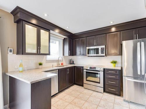 Cuisine - 1880 Rue De Joybert, Terrebonne (Terrebonne), QC - Indoor Photo Showing Kitchen With Upgraded Kitchen