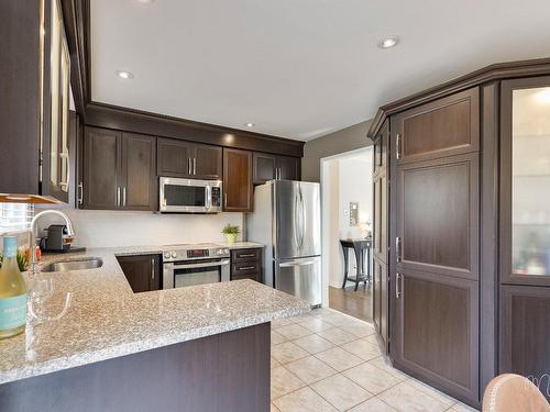 Cuisine - 1880 Rue De Joybert, Terrebonne (Terrebonne), QC - Indoor Photo Showing Kitchen With Upgraded Kitchen