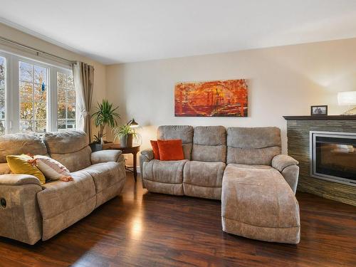 Living room - 3960 Crois. Oscar, Brossard, QC - Indoor Photo Showing Living Room With Fireplace