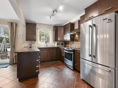 Kitchen - 3960 Crois. Oscar, Brossard, QC - Indoor Photo Showing Kitchen With Double Sink