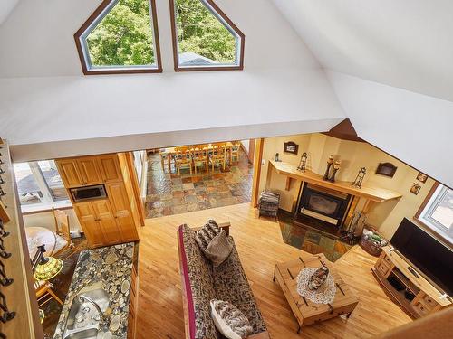 Living room - 7381 Ch. Du Coteau-Du-Lac, Saint-Damien, QC - Indoor With Fireplace