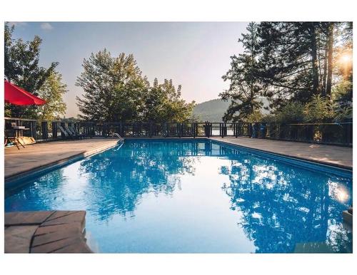 Piscine - 110-1 Ch. De La Fraternité, Lac-Supérieur, QC - Outdoor With In Ground Pool With Backyard