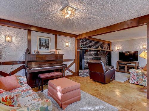 Family room - 273 Rue Valois, Saint-Bruno-De-Montarville, QC - Indoor Photo Showing Other Room With Fireplace