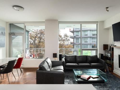 204-4011 Rainbow Hill Lane, Saanich, BC - Indoor Photo Showing Living Room With Fireplace