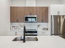 607-2770 Winster Rd, Langford, BC  - Indoor Photo Showing Kitchen With Double Sink With Upgraded Kitchen 