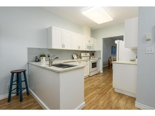 205-555 4Th St, Courtenay, BC - Indoor Photo Showing Kitchen With Double Sink