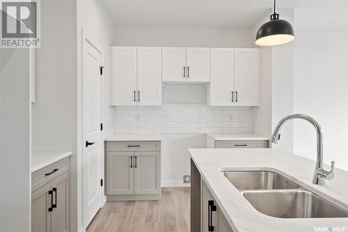 71 651 Dubois Crescent, Saskatoon, SK - Indoor Photo Showing Kitchen With Double Sink