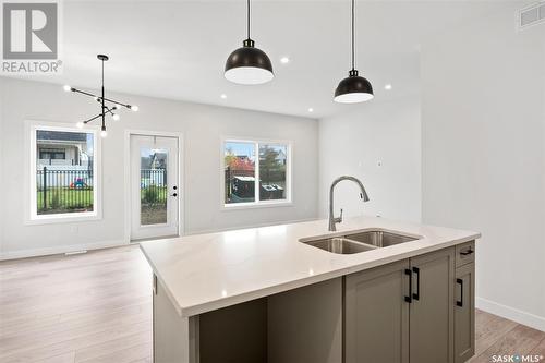 71 651 Dubois Crescent, Saskatoon, SK - Indoor Photo Showing Kitchen With Double Sink