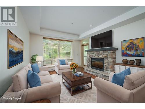 2770 Auburn Road Unit# 207, West Kelowna, BC - Indoor Photo Showing Living Room With Fireplace