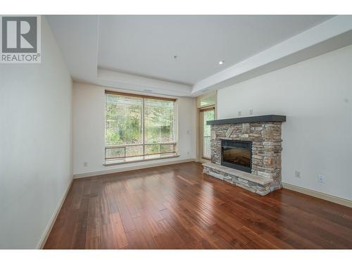 2770 Auburn Road Unit# 207, West Kelowna, BC - Indoor Photo Showing Living Room With Fireplace