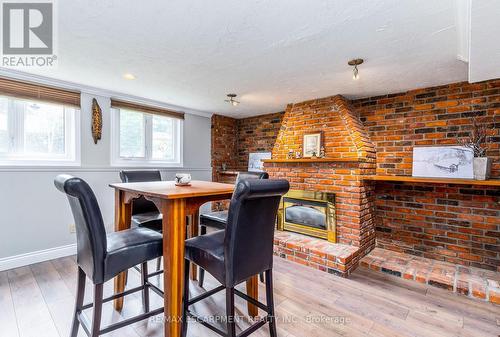 19 Isabel Drive, Brantford, ON - Indoor Photo Showing Dining Room With Fireplace