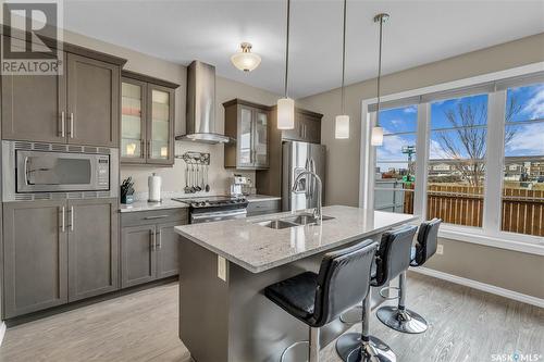 150 3229 Elgaard Drive, Regina, SK - Indoor Photo Showing Kitchen With Double Sink With Upgraded Kitchen