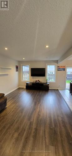 707 Guiness Way, London, ON - Indoor Photo Showing Living Room With Fireplace