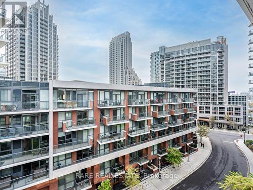 718 - 50 Bruyeres Mews, Toronto, ON - Outdoor With Balcony With Facade