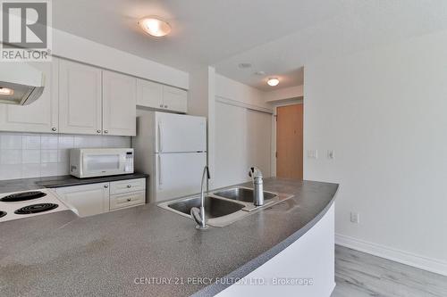 302 - 60 Brian Harrison Way, Toronto, ON - Indoor Photo Showing Kitchen With Double Sink