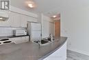 302 - 60 Brian Harrison Way, Toronto, ON  - Indoor Photo Showing Kitchen With Double Sink 