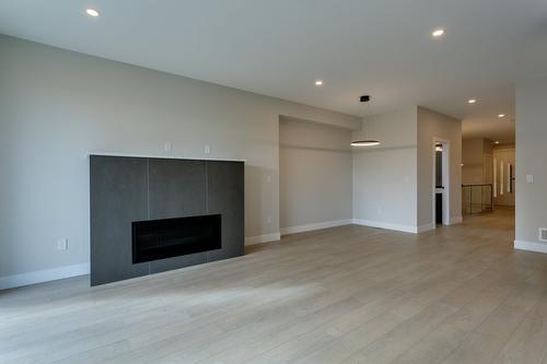 1675 Harbour View Crescent, West Kelowna, BC - Indoor Photo Showing Living Room With Fireplace