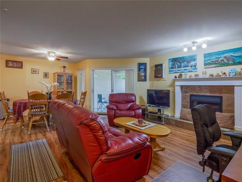 308-1750 Atkinson Street, Penticton, BC - Indoor Photo Showing Living Room With Fireplace