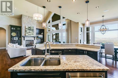 734 Kuipers Crescent, Kelowna, BC - Indoor Photo Showing Kitchen With Fireplace With Double Sink With Upgraded Kitchen