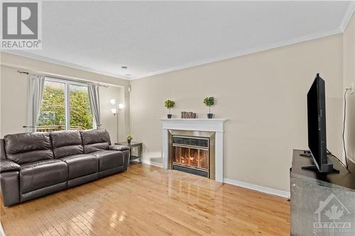 5 Gamma Court, Ottawa, ON - Indoor Photo Showing Living Room With Fireplace