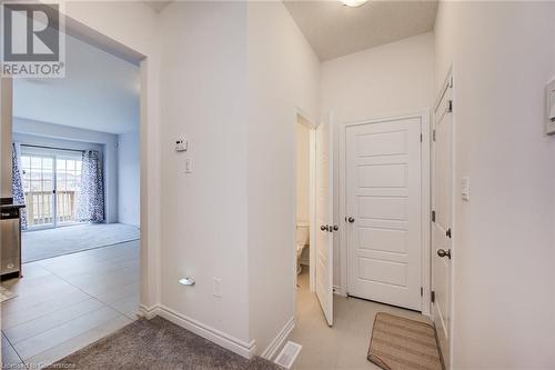 Hall with light tile patterned flooring - 26 Elsegood Drive, Guelph, ON - Indoor Photo Showing Other Room