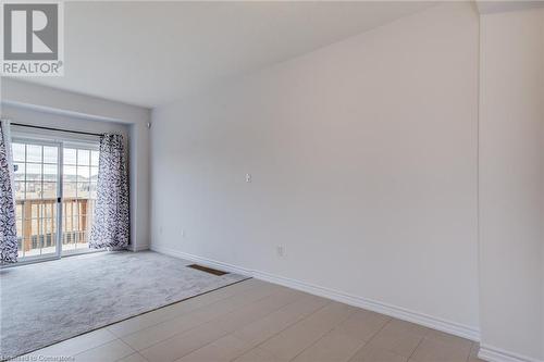 View of carpeted empty room - 26 Elsegood Drive, Guelph, ON - Indoor Photo Showing Other Room