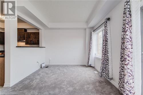 View of carpeted empty room - 26 Elsegood Drive, Guelph, ON - Indoor Photo Showing Other Room