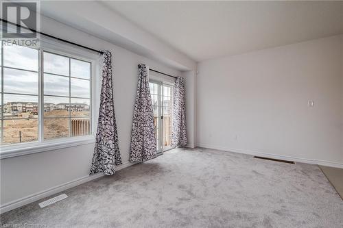 View of carpeted empty room - 26 Elsegood Drive, Guelph, ON - Indoor Photo Showing Other Room