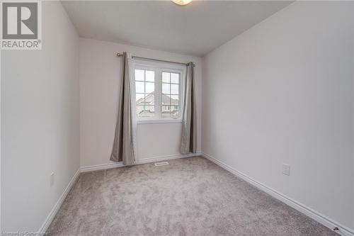 View of carpeted empty room - 26 Elsegood Drive, Guelph, ON - Indoor Photo Showing Other Room