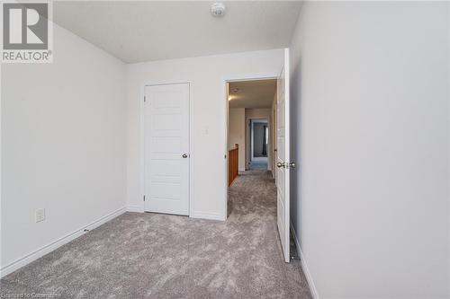 Unfurnished bedroom featuring light colored carpet - 26 Elsegood Drive, Guelph, ON - Indoor Photo Showing Other Room