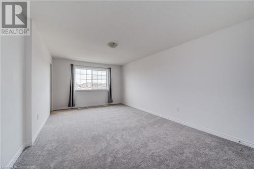 View of carpeted empty room - 26 Elsegood Drive, Guelph, ON - Indoor Photo Showing Other Room