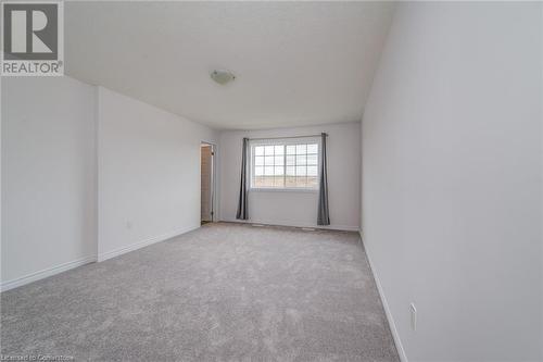 Empty room with light carpet - 26 Elsegood Drive, Guelph, ON - Indoor Photo Showing Other Room