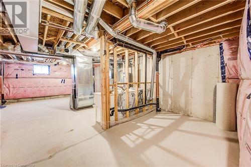 Basement with washer / dryer and heating unit - 26 Elsegood Drive, Guelph, ON - Indoor Photo Showing Basement