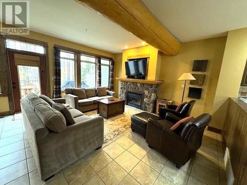 1351 Gerry Sorensen Way Unit# Q2-D, Kimberley, BC - Indoor Photo Showing Living Room With Fireplace