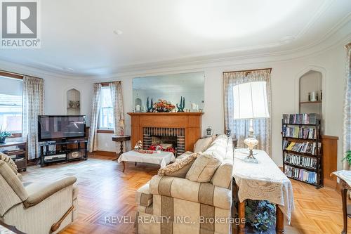 19 Pottruff Road S, Hamilton, ON - Indoor Photo Showing Living Room With Fireplace