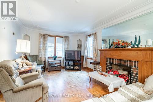 19 Pottruff Road S, Hamilton, ON - Indoor Photo Showing Living Room With Fireplace