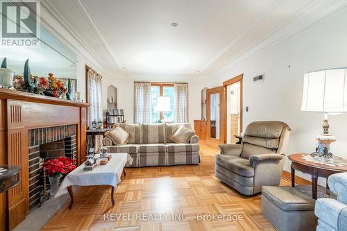 19 Pottruff Road S, Hamilton, ON - Indoor Photo Showing Living Room With Fireplace