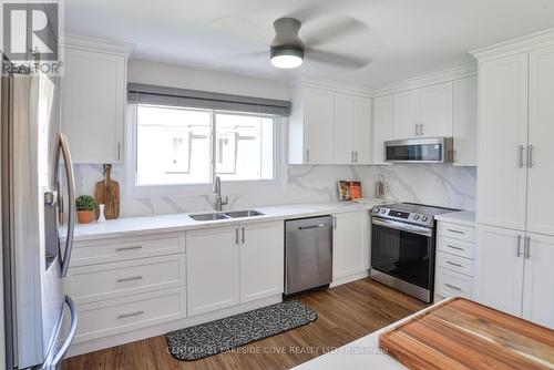 Unit #6 - 4 Paradise Boulevard W, Ramara, ON - Indoor Photo Showing Kitchen With Double Sink