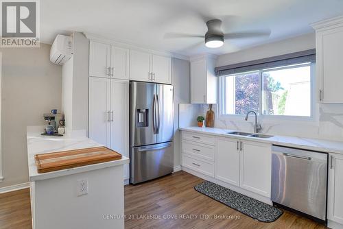 Unit #6 - 4 Paradise Boulevard W, Ramara, ON - Indoor Photo Showing Kitchen With Double Sink