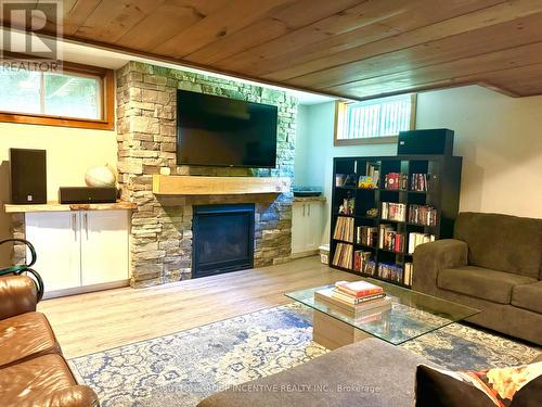 7590 8Th Line, Essa, ON - Indoor Photo Showing Living Room With Fireplace