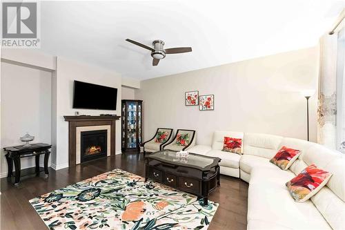 168 Eric Maloney Way, Ottawa, ON - Indoor Photo Showing Living Room With Fireplace